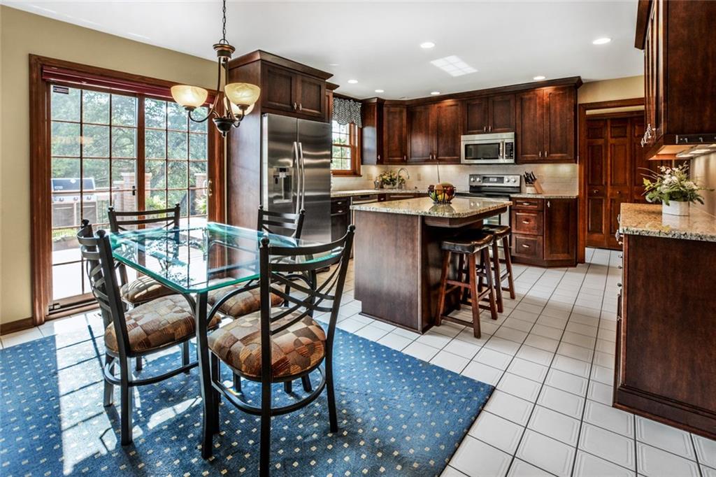 261 Pinkerton Road Wexford, PA 15090 - Photo 2 of 25 Updated Kitchen w/Granite Countertops, 42" Cabinets, Stainless Appliances, Double Oven Stove, Recessed Lighting & Ceramic Tile Flooring.