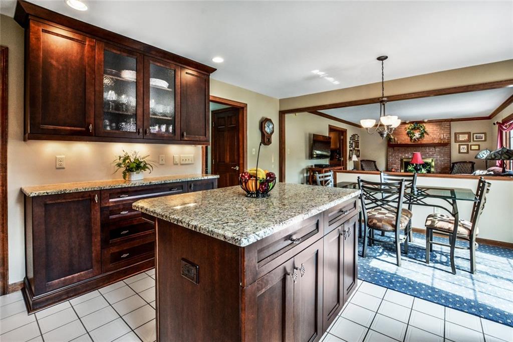 261 Pinkerton Road Wexford, PA 15090 - Photo 4 of 25 Updated Kitchen w/Granite Countertops, 42" Cabinets, Stainless Appliances, Double Oven Stove, Recessed Lighting & Ceramic Tile Flooring.
