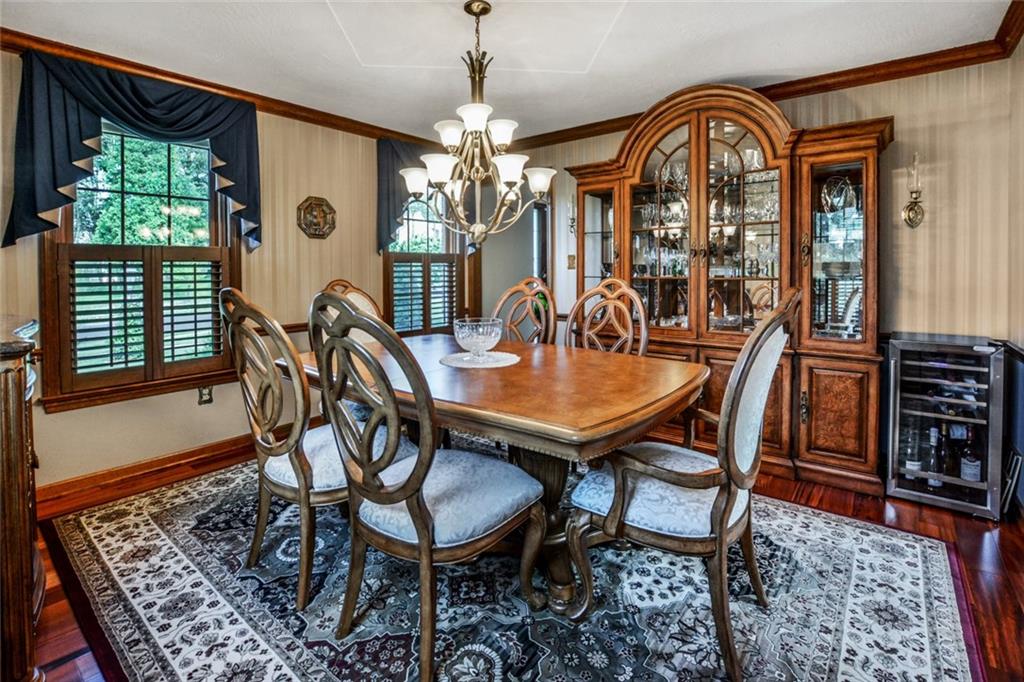 261 Pinkerton Road Wexford, PA 15090 - Photo 8 of 25 Dining Room w/Hardwood Floors, Chair Rail, Crown Moldings & Shutters.