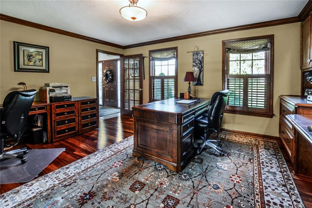 261 Pinkerton Road Wexford, PA 15090 - Photo 10 of 25 Den w/Hardwood Floors, Custom Cabinets & Shelf's, French Doors & Crown Moldings.