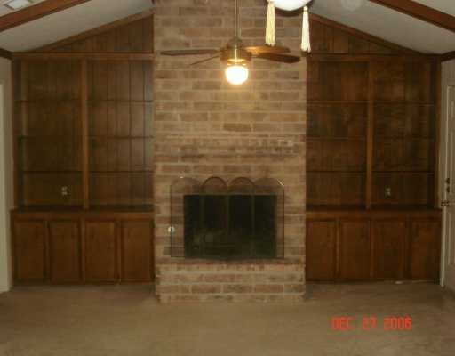 4914 Goldeneye Drive Corpus Christi, TX 78413 - Photo 2 of 10 a room with a fireplace
