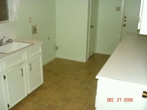 a bathroom with a sink and a shower