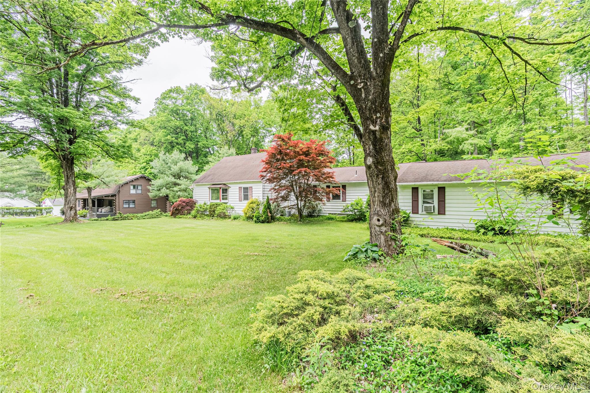 6 Swain Road Pleasant Valley, NY 12569 - Photo 15 of 33 a front view of a house with garden