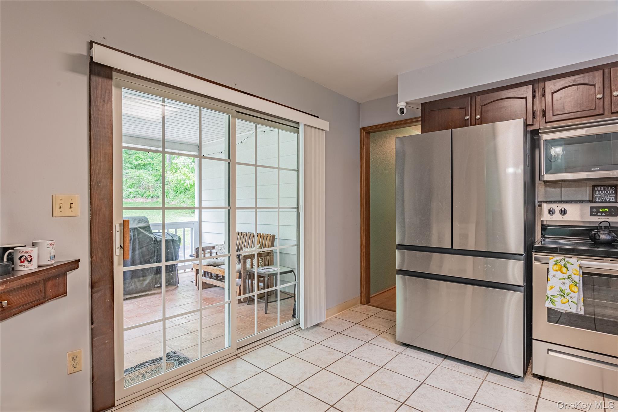 6 Swain Road Pleasant Valley, NY 12569 - Photo 24 of 33 a kitchen with a refrigerator and cabinets