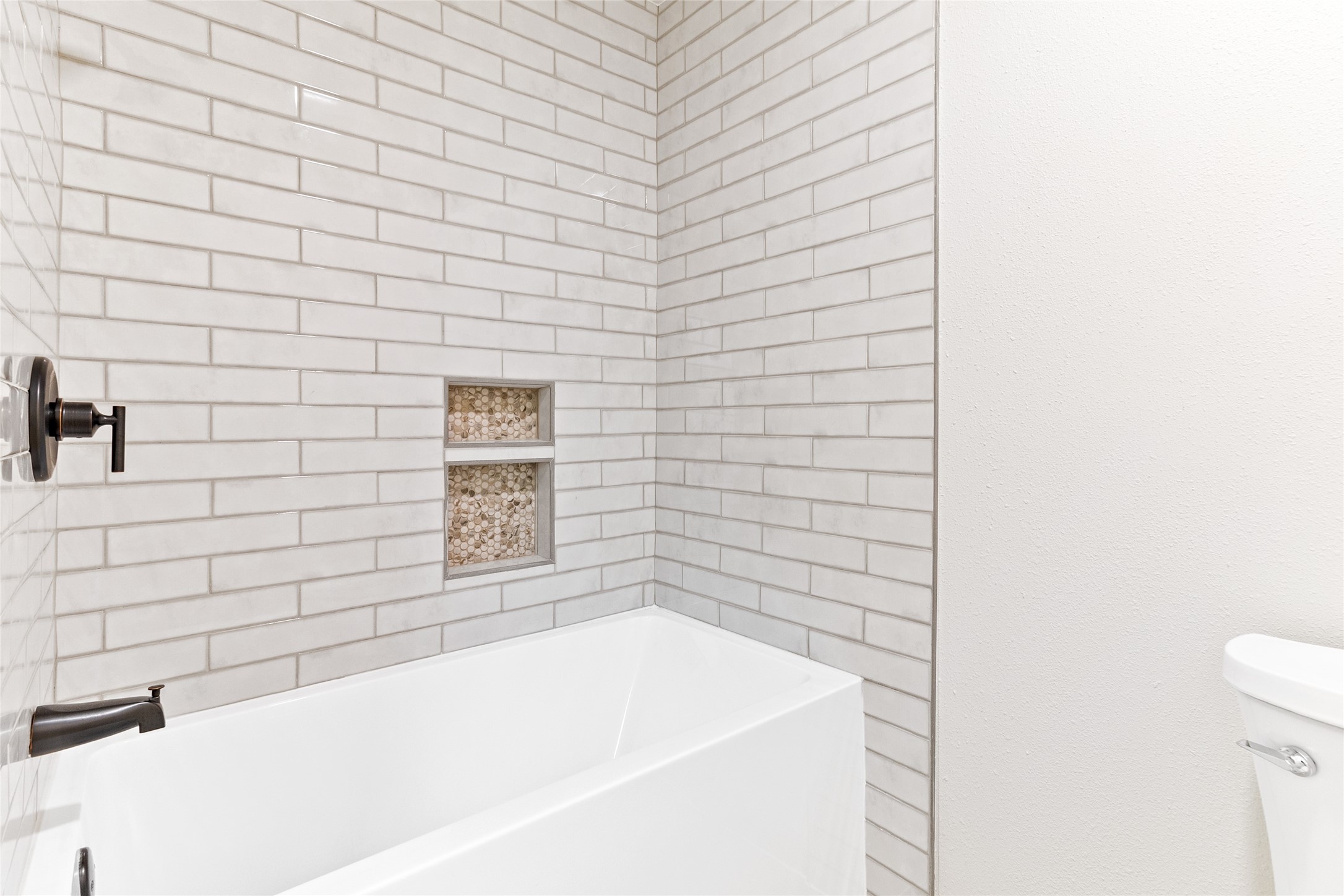 1108 Nottingham Drive Angleton, TX 77515 - Photo 13 of 23 a bathroom with a bathtub
