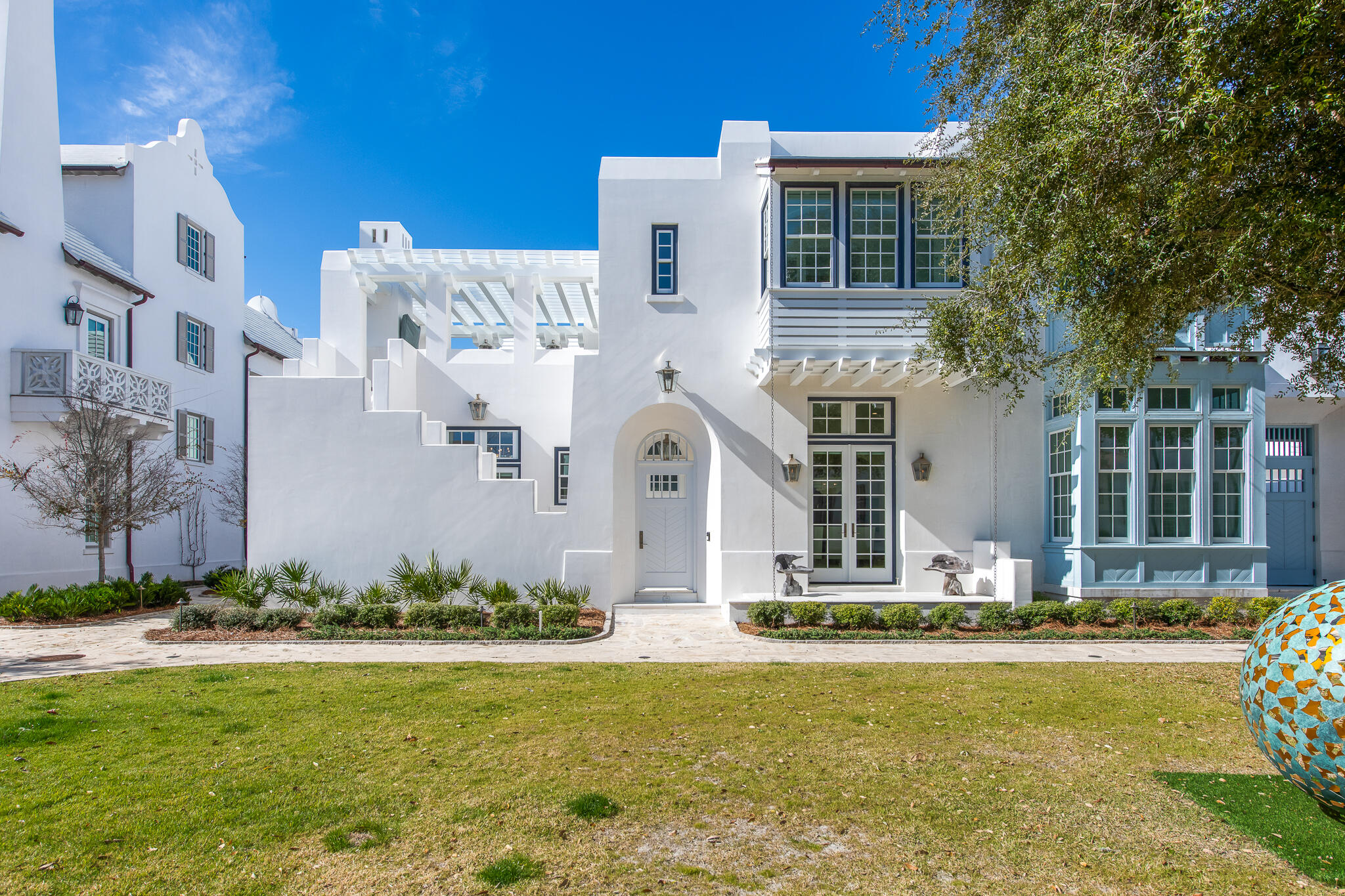 a front view of a house with swimming pool