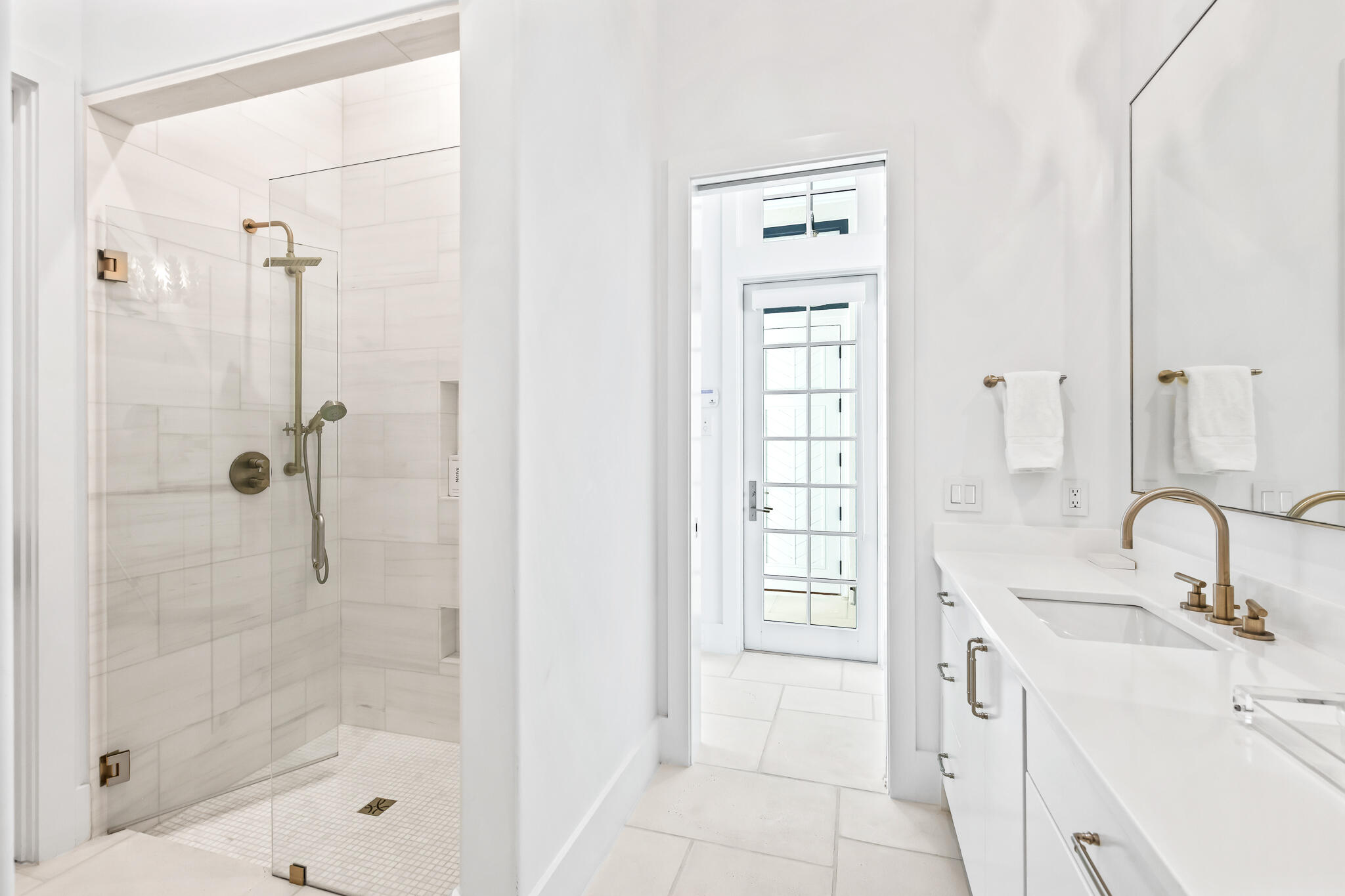 40 Smugglers Alley Inlet Beach, FL 32461 - Photo 17 of 59 a bathroom with a granite countertop sink a shower and a mirror