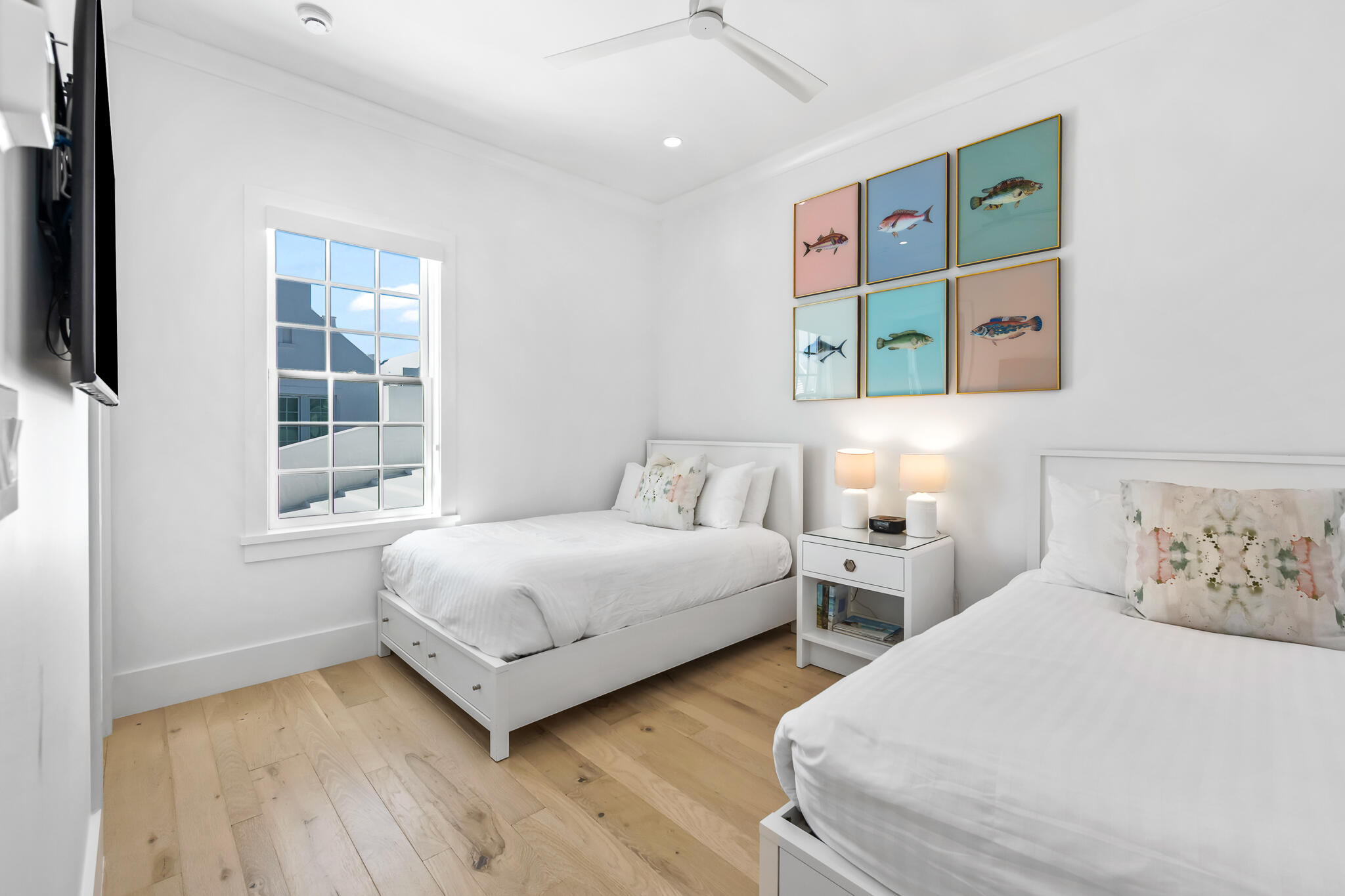 40 Smugglers Alley Inlet Beach, FL 32461 - Photo 20 of 59 a bedroom with two beds and a window