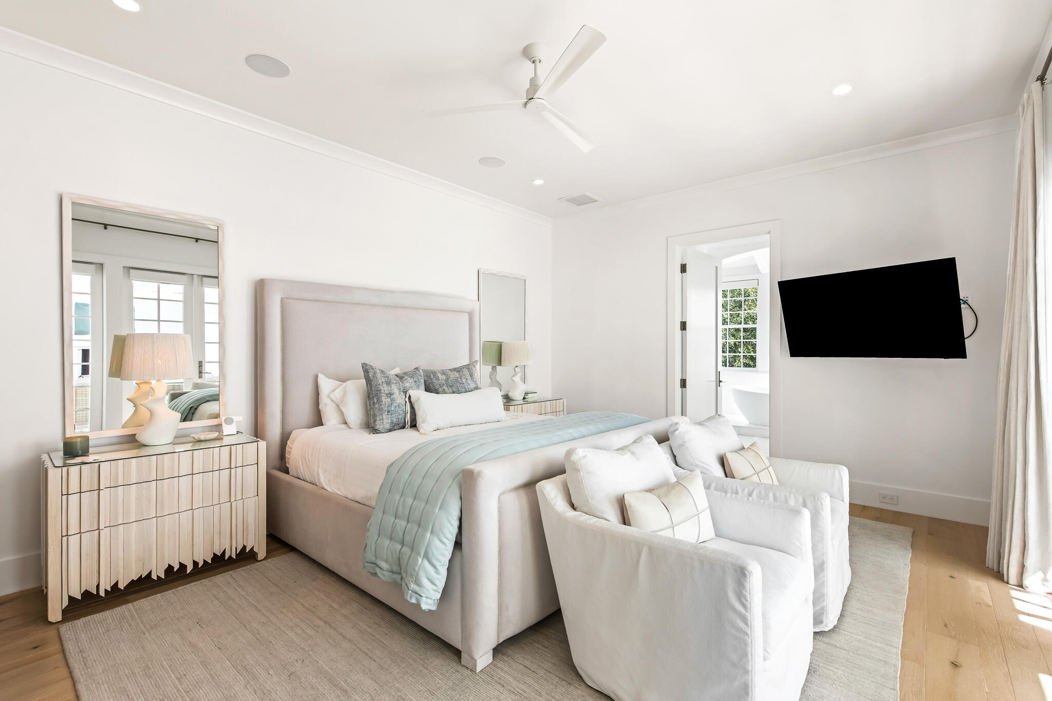 40 Smugglers Alley Inlet Beach, FL 32461 - Photo 32 of 59 a bedroom with a bed and a flat screen tv