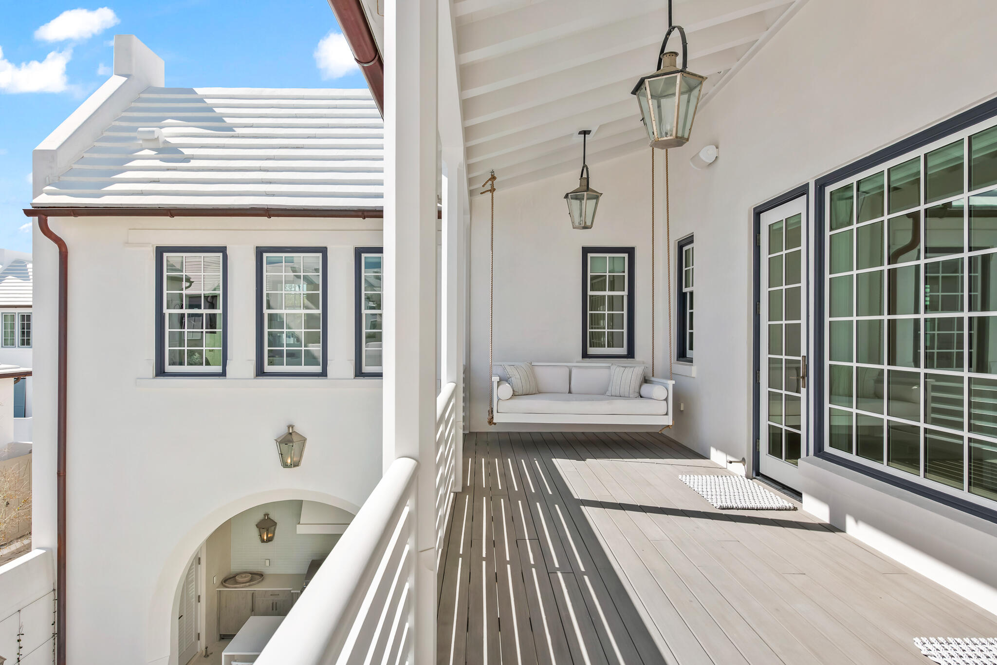 40 Smugglers Alley Inlet Beach, FL 32461 - Photo 46 of 59 a view of a balcony with wooden floor and furniture