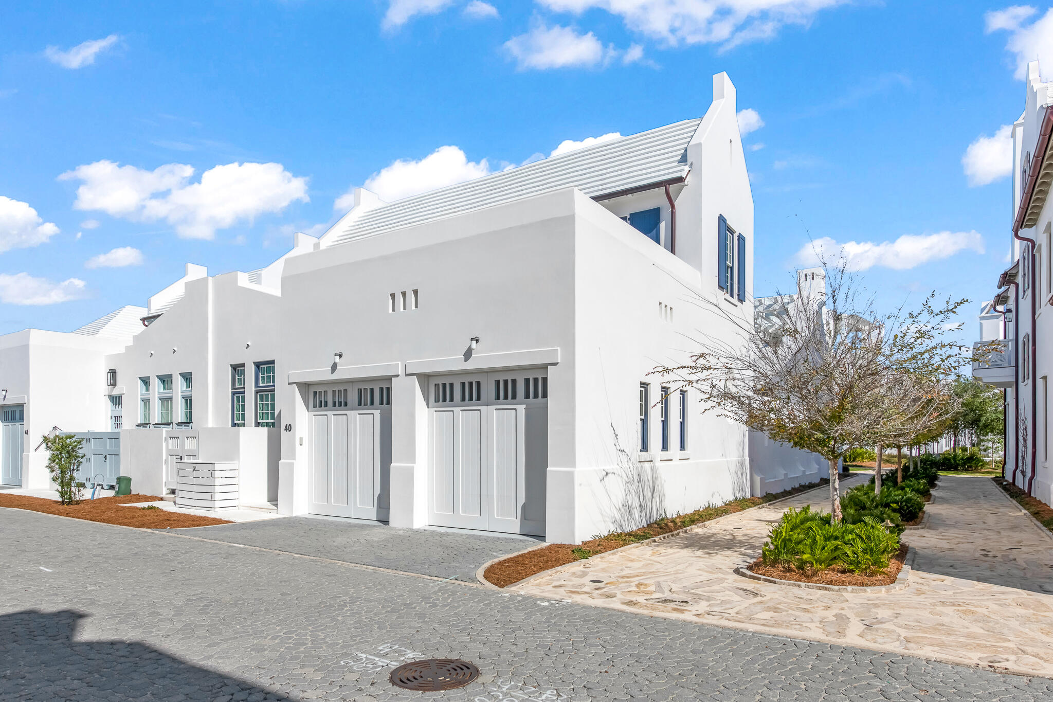 40 Smugglers Alley Inlet Beach, FL 32461 - Photo 49 of 59 a view of a building with a street
