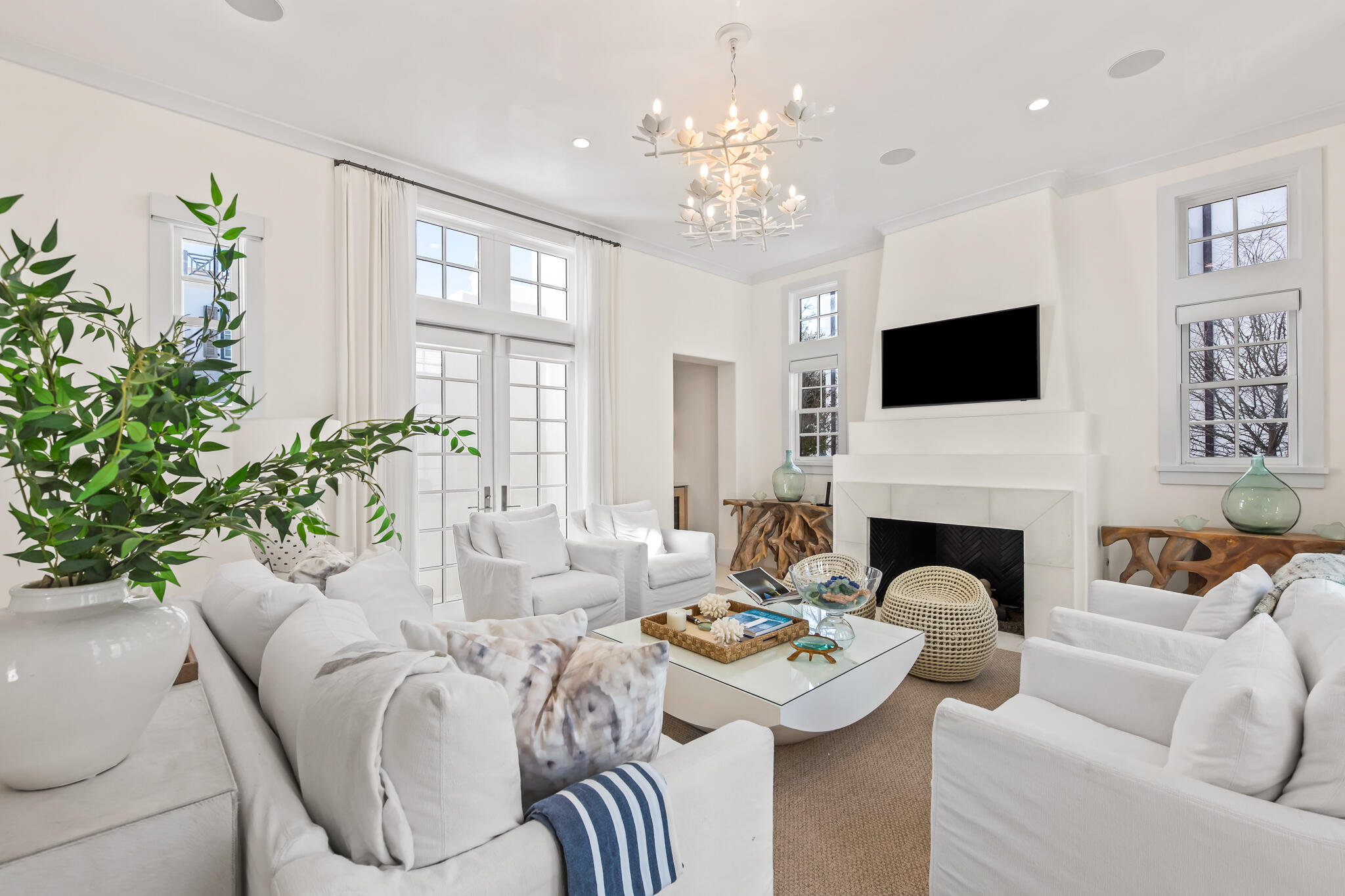 40 Smugglers Alley Inlet Beach, FL 32461 - Photo 8 of 59 a living room with furniture a fireplace and a flat screen tv