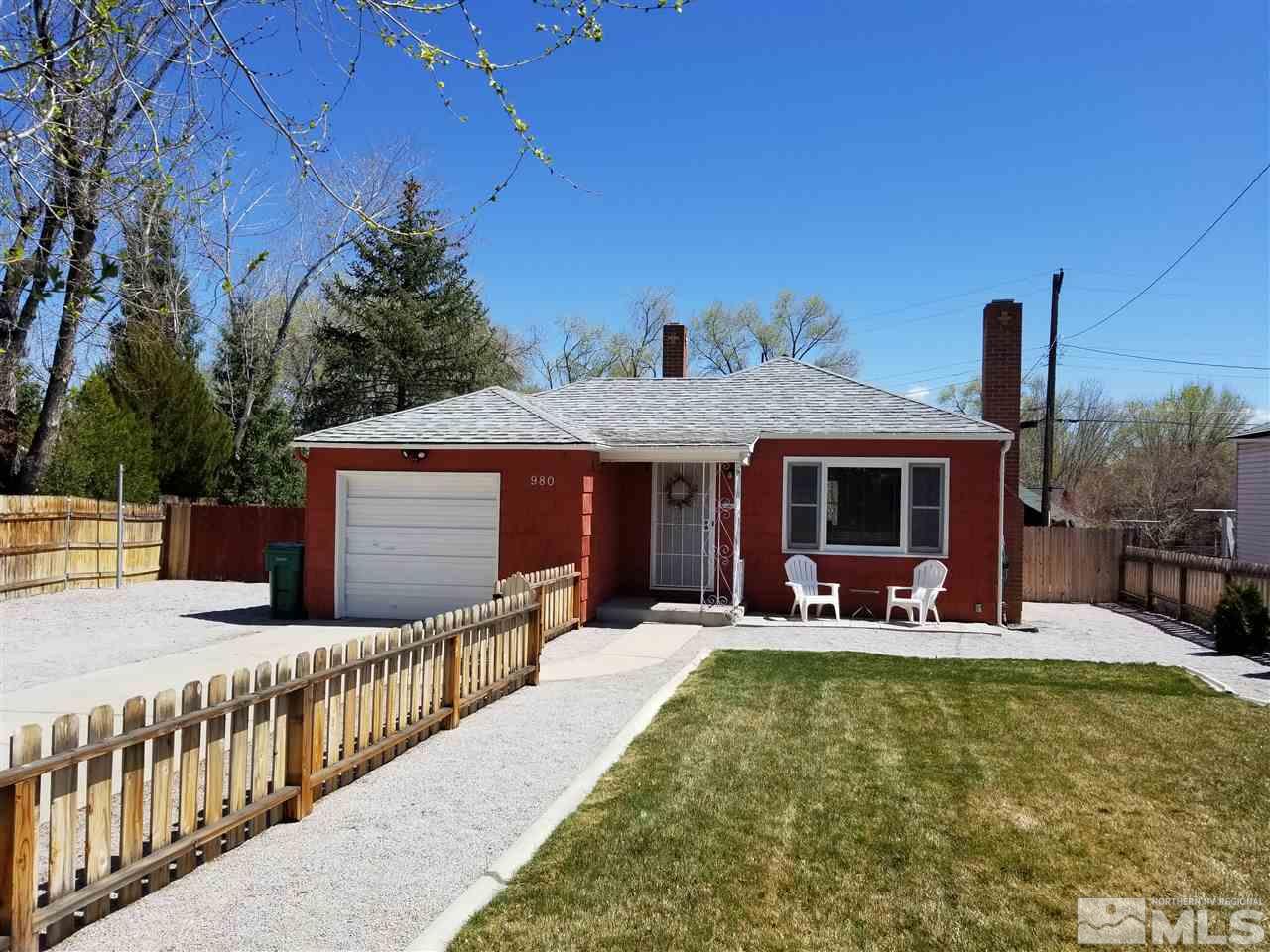 980 Gear Street Reno, NV 89503 - Photo 1 of 1 a front view of house with yard outdoor seating and barbeque oven