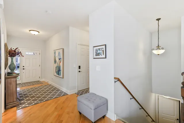 a bedroom with a bed and a rug