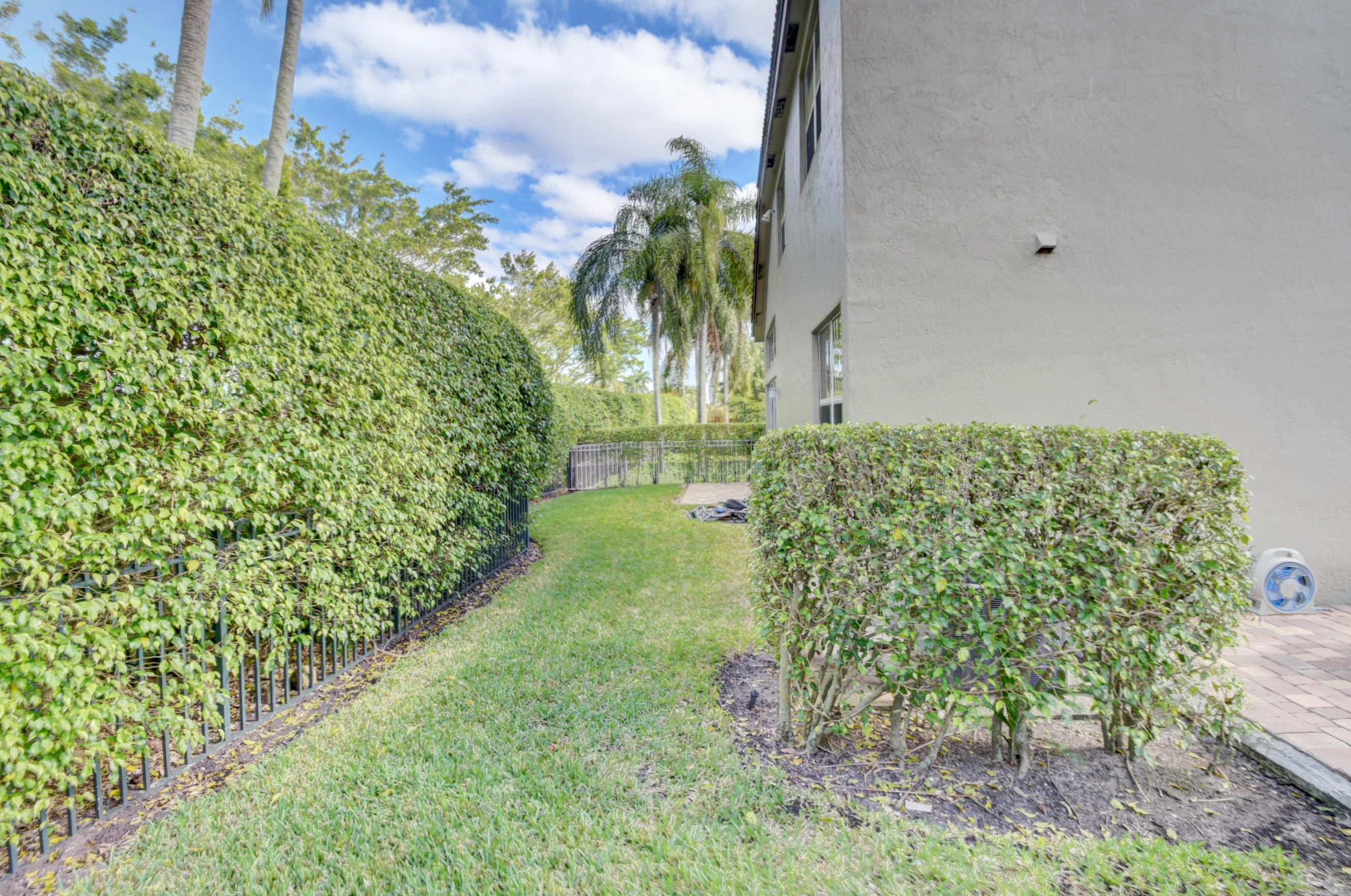 3387 Northwest 53rd Circle Boca Raton, FL 33496 - Photo 29 of 29 Rear Grassy Area