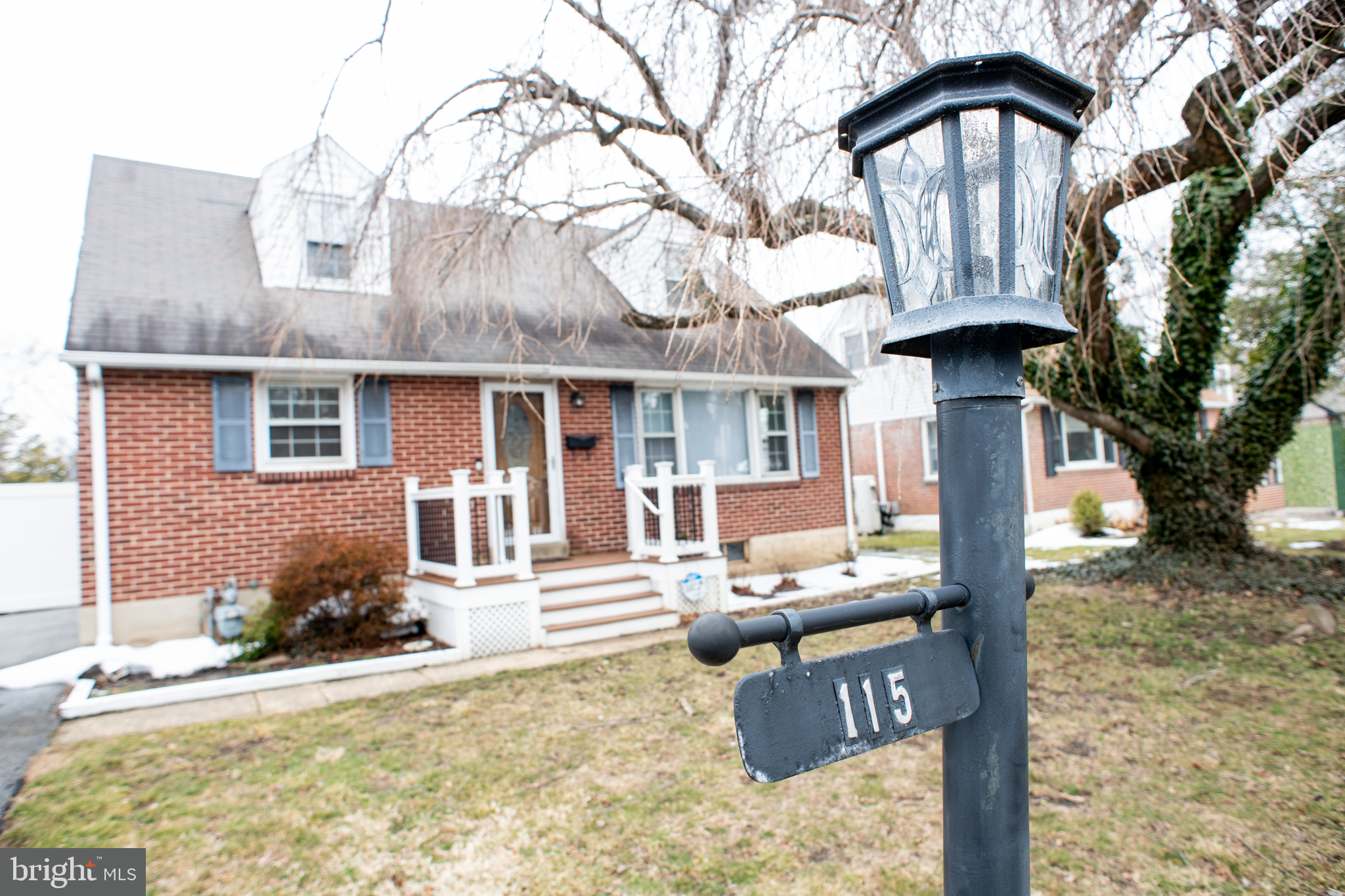115 Murphy Road Wilmington, DE 19803 - Photo 1 of 17 a front view of a house with yard outdoor seating and covered with snow