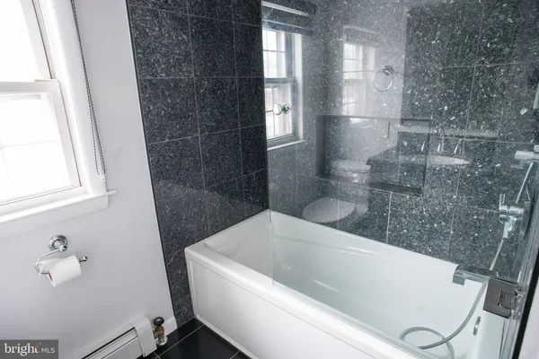 a bathroom with a bathtub