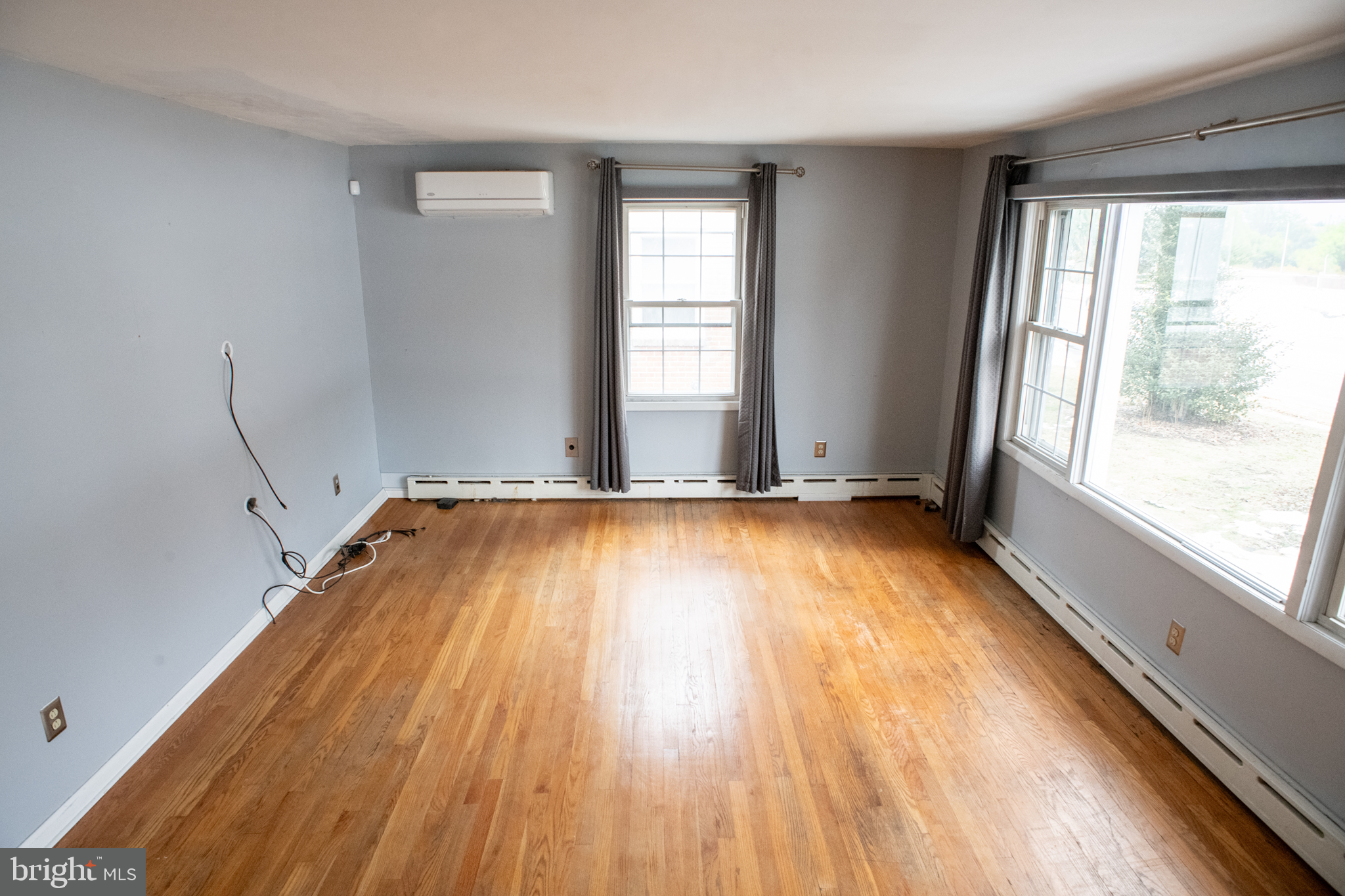 115 Murphy Road Wilmington, DE 19803 - Photo 2 of 17 a view of a room with wooden floor and a window