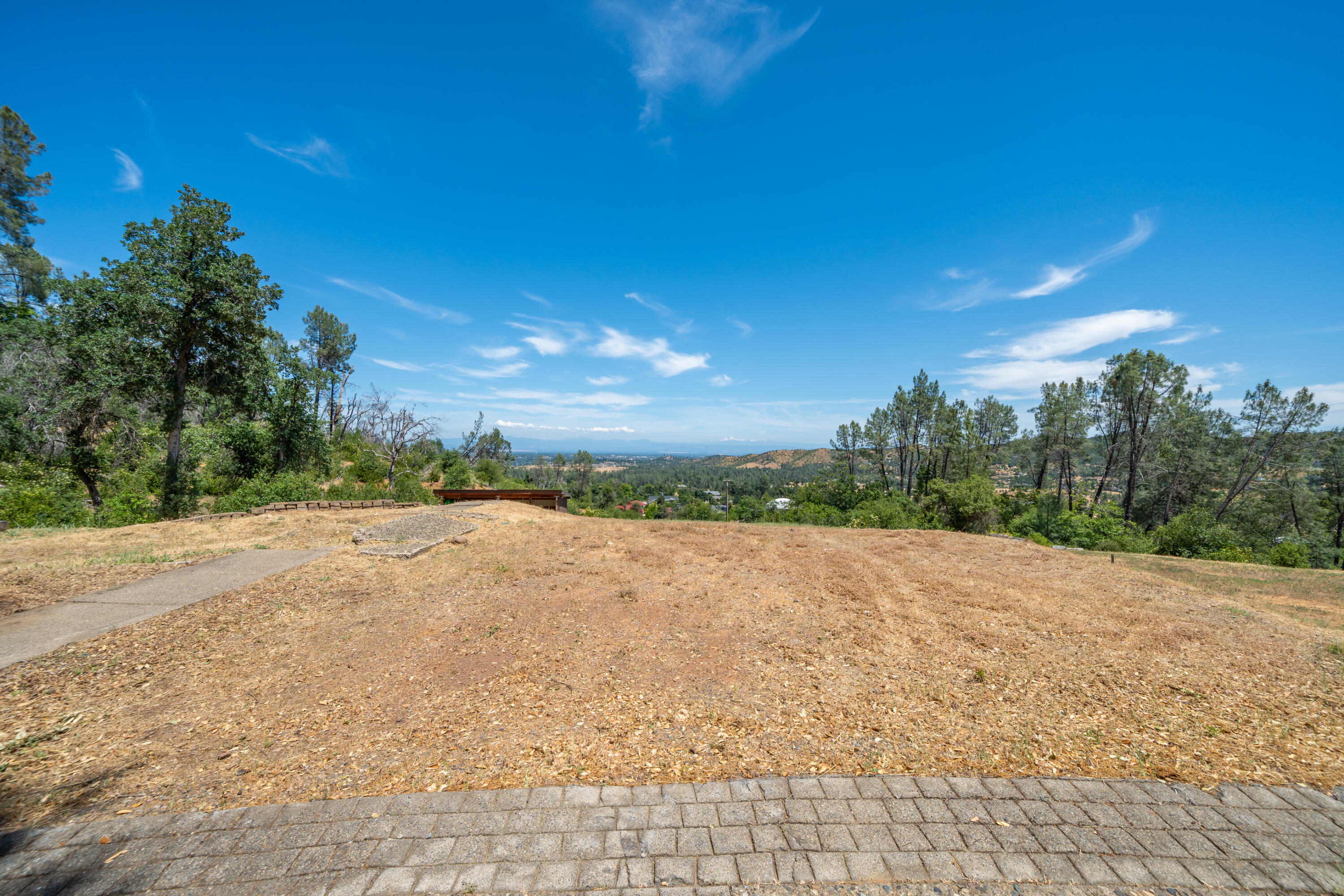 15809 Old Stage Coach Road Redding, CA 96001 - Photo 2 of 44 a view of an outdoor space and a yard