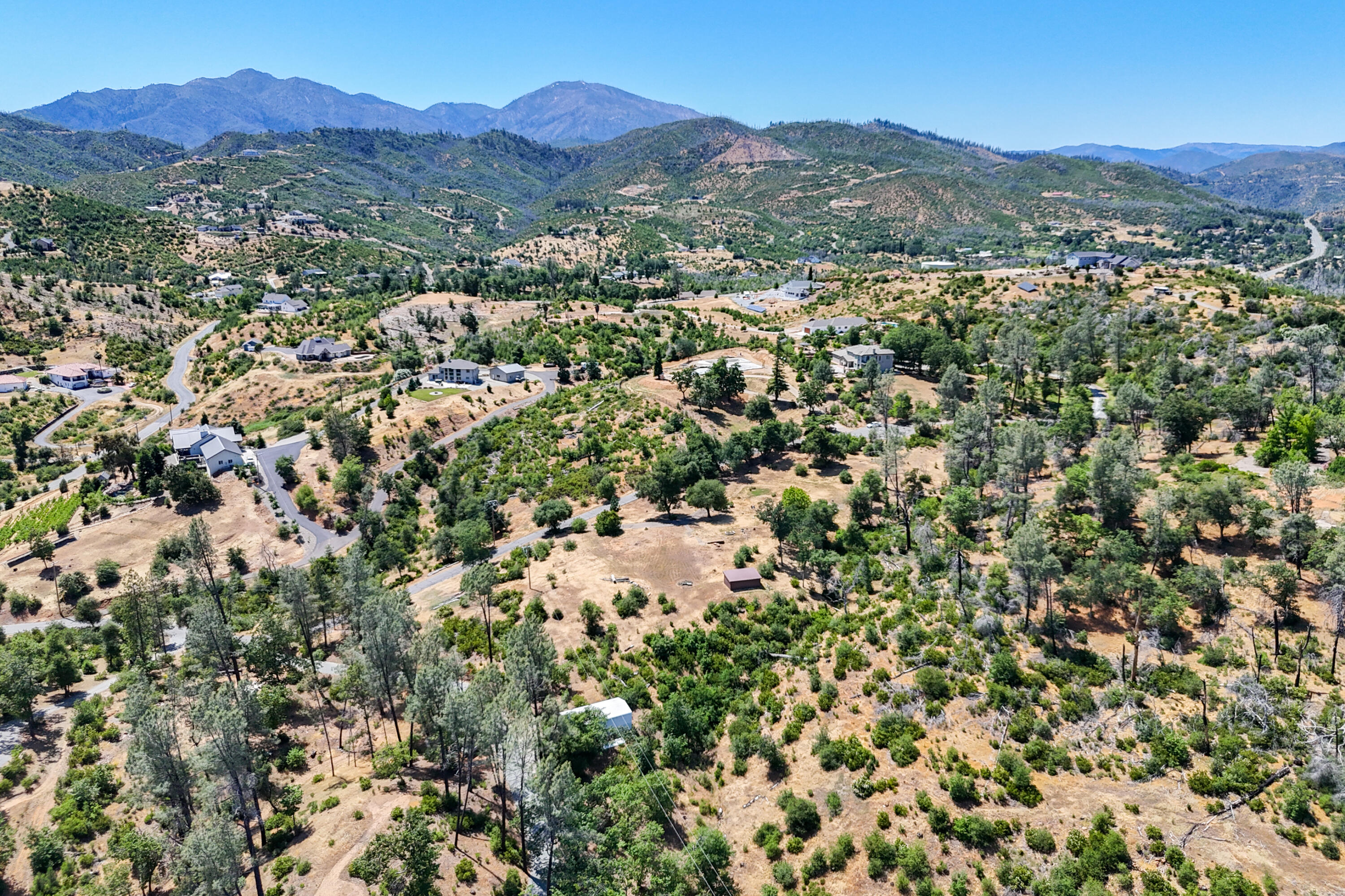 15809 Old Stage Coach Road Redding, CA 96001 - Photo 26 of 44 a view of a city with mountain