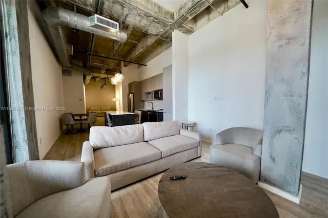 a living room with furniture and a couch