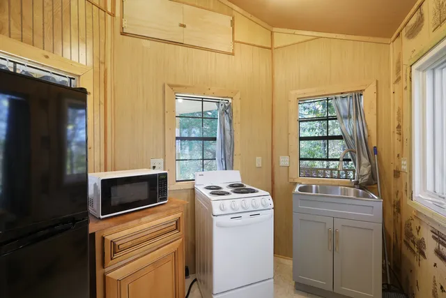a bedroom with a bed and a walk in closet