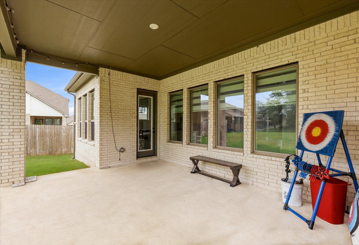 117 Peacevine Lane Georgetown, TX 78628 - Photo 27 of 31 extended covered patio!