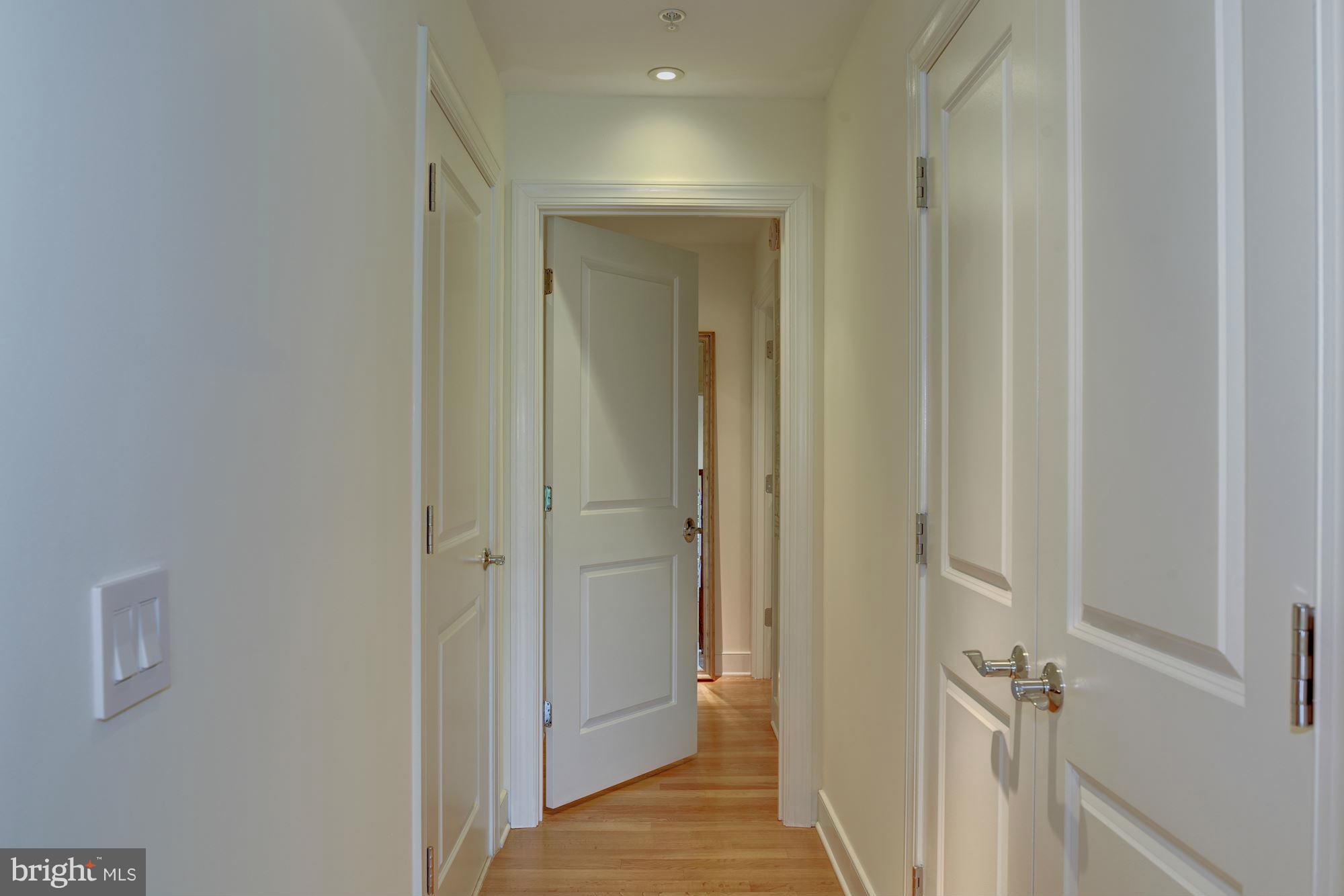 2425 L Street Northwest, Unit 340 Washington, DC 20037 - Photo 12 of 30 a view of a bathroom from a hallway