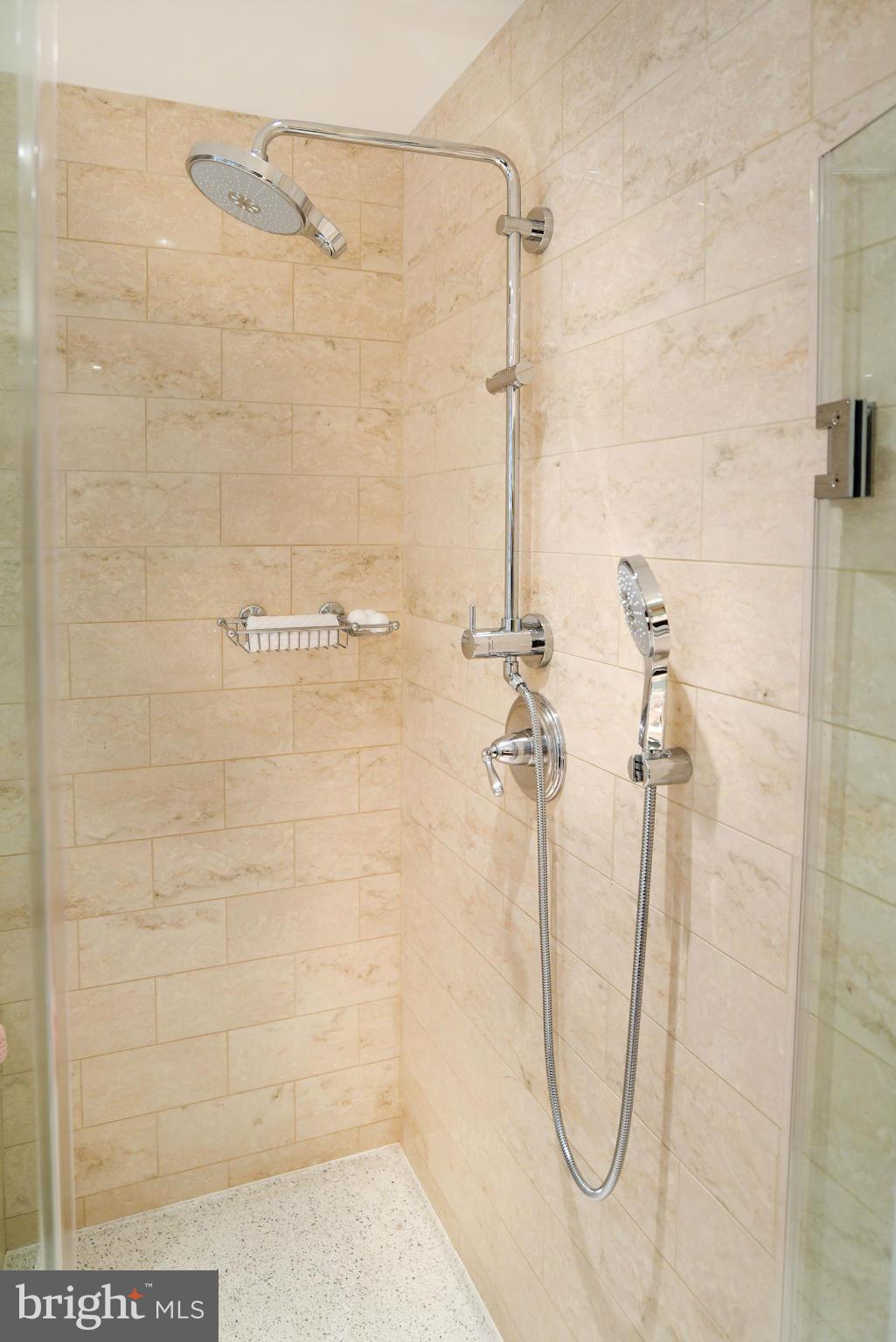 2425 L Street Northwest, Unit 340 Washington, DC 20037 - Photo 17 of 30 a bathroom with a shower
