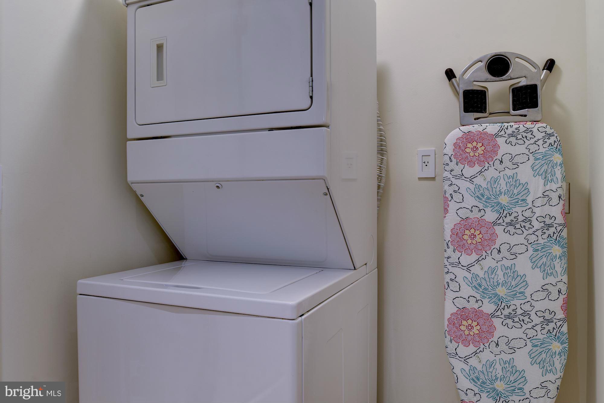 2425 L Street Northwest, Unit 340 Washington, DC 20037 - Photo 19 of 30 a utility room with dryer and washer