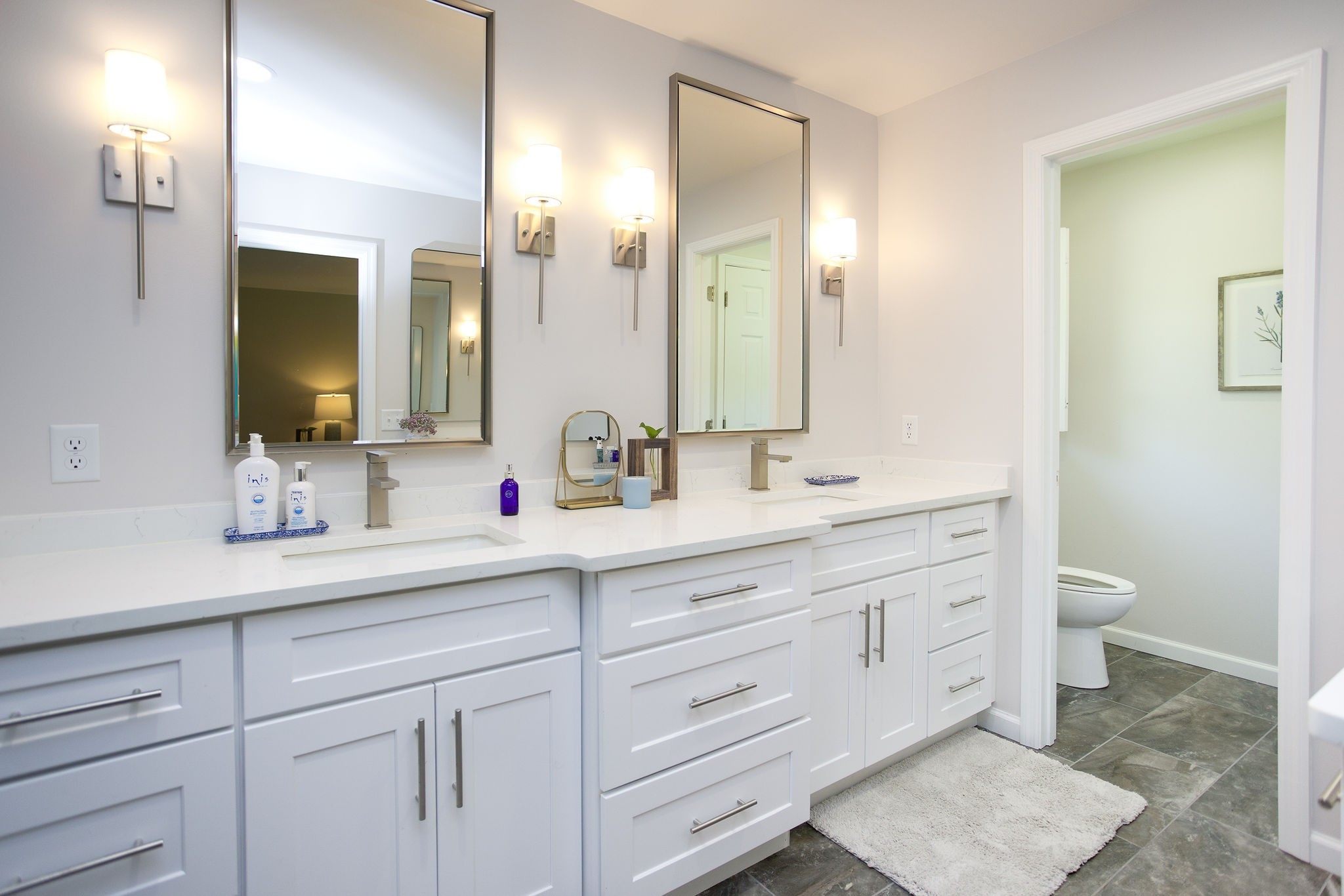 1747 Allen Ferry Road Smithville, TN 37166 - Photo 18 of 45 a bathroom with a toilet sink and mirror