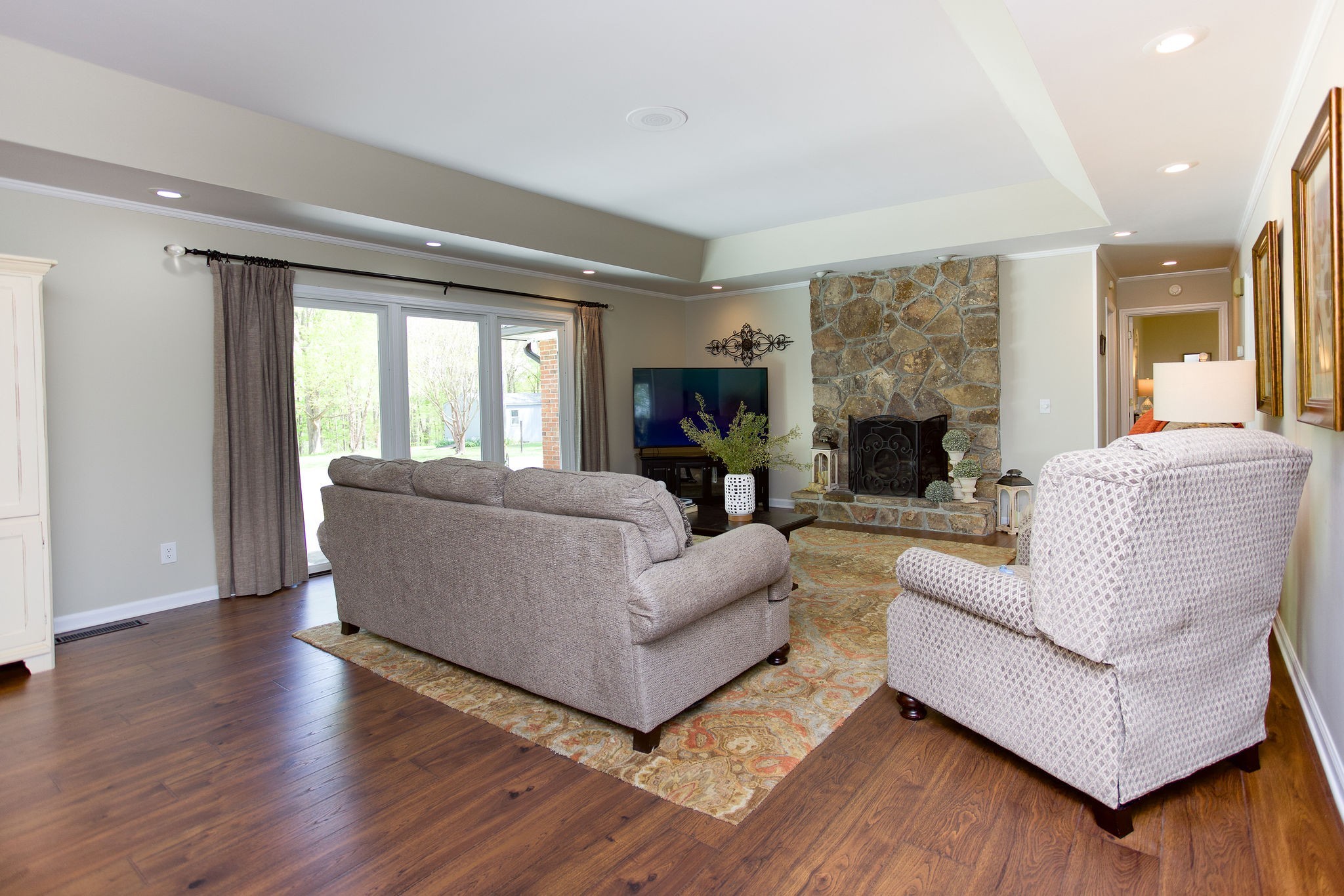 1747 Allen Ferry Road Smithville, TN 37166 - Photo 9 of 45 a living room with furniture and a fireplace
