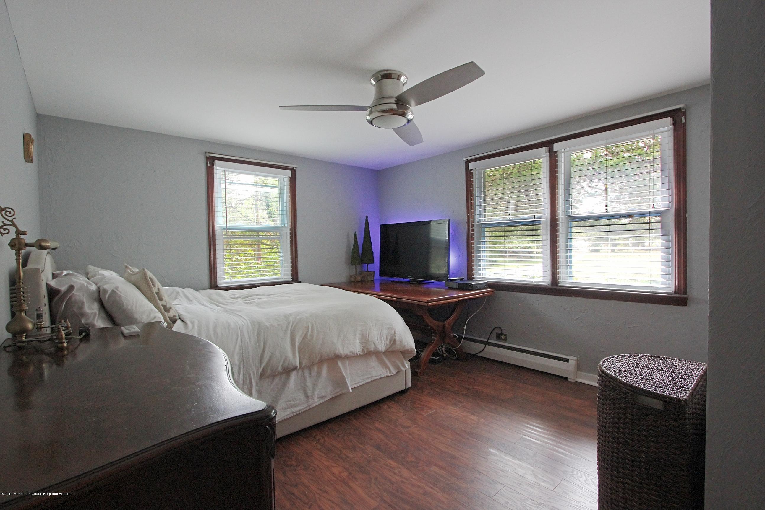 500 Hyson Road Jackson, NJ 08527 - Photo 12 of 30 a bedroom with a bed and a window