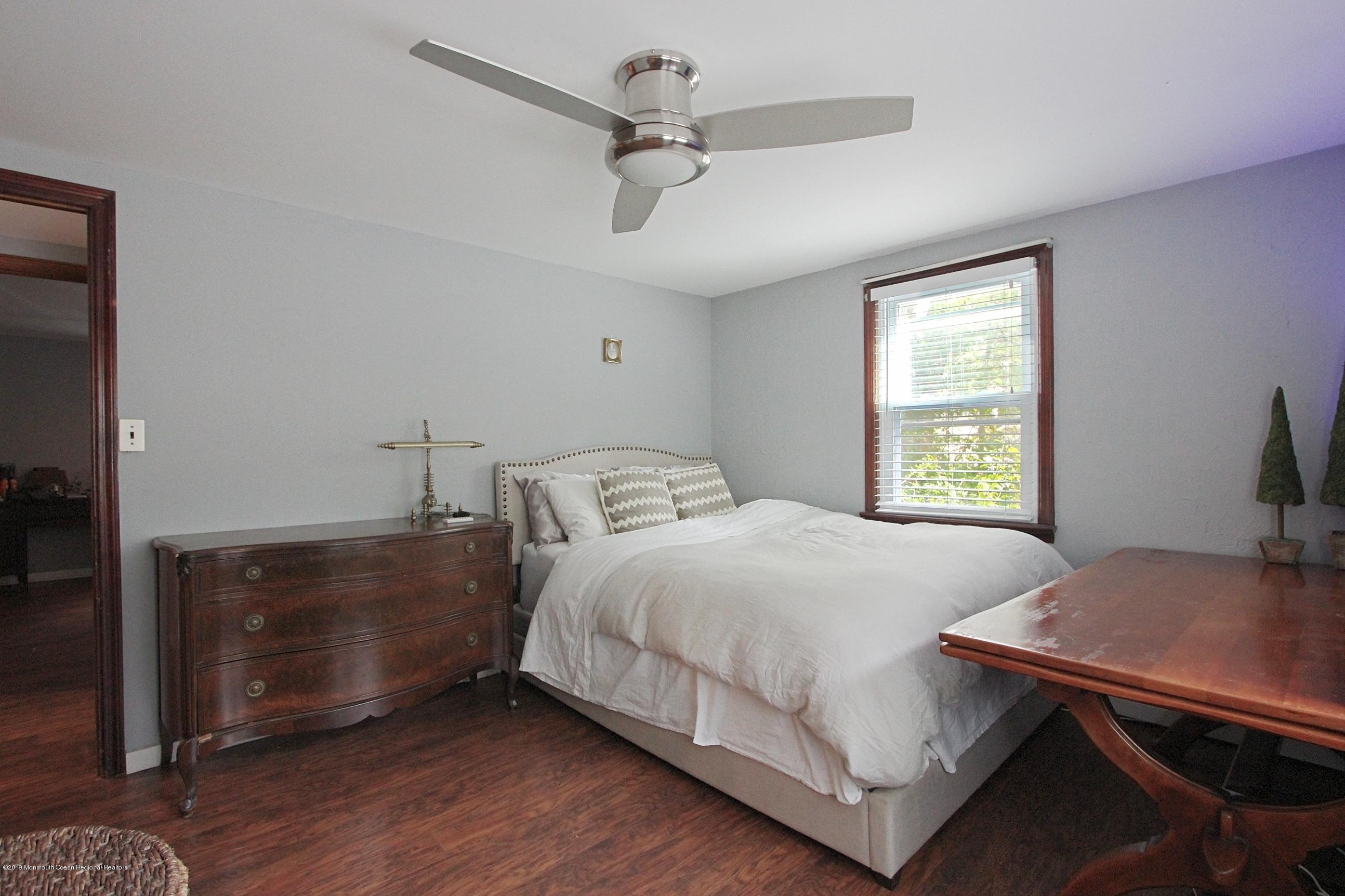 500 Hyson Road Jackson, NJ 08527 - Photo 13 of 30 a bedroom with a bed and a window