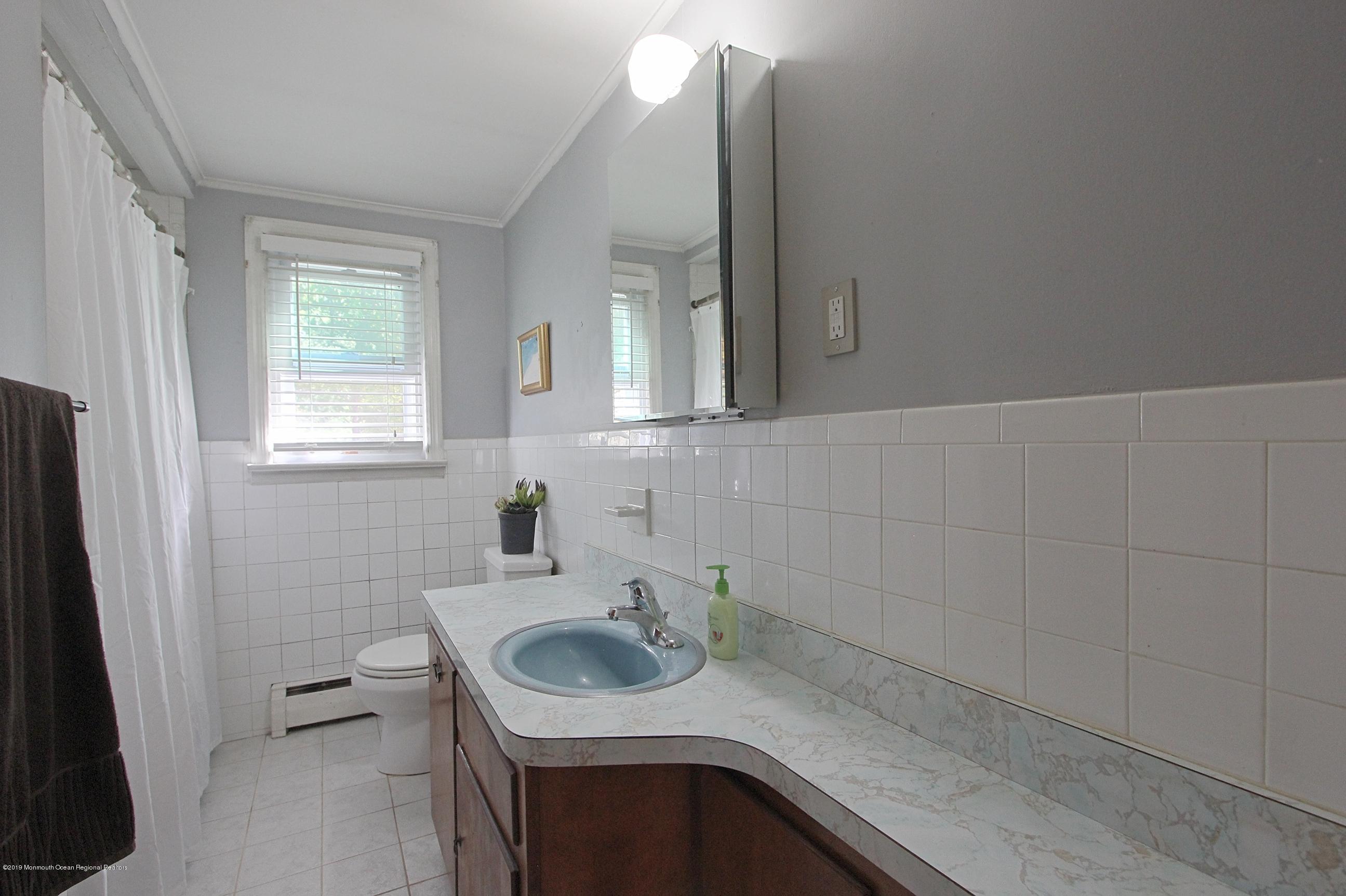500 Hyson Road Jackson, NJ 08527 - Photo 14 of 30 a bathroom with a sink and toilet