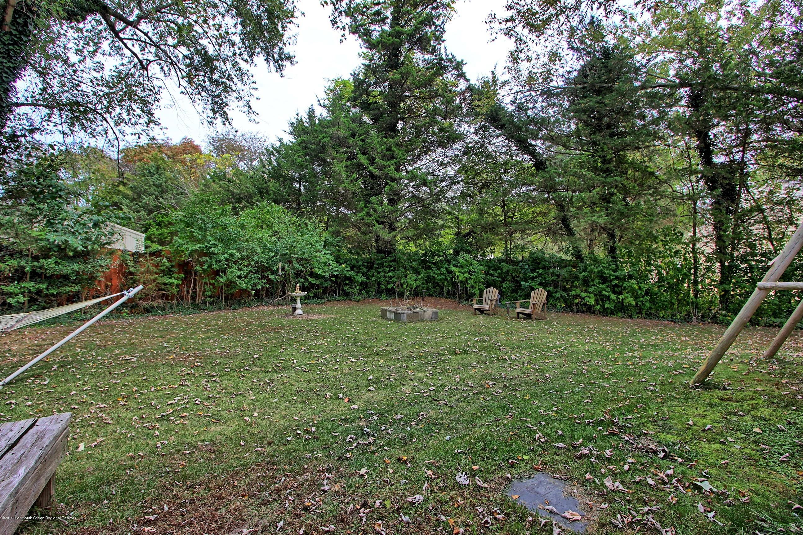 500 Hyson Road Jackson, NJ 08527 - Photo 24 of 30 a view of a green field with lots of bushes
