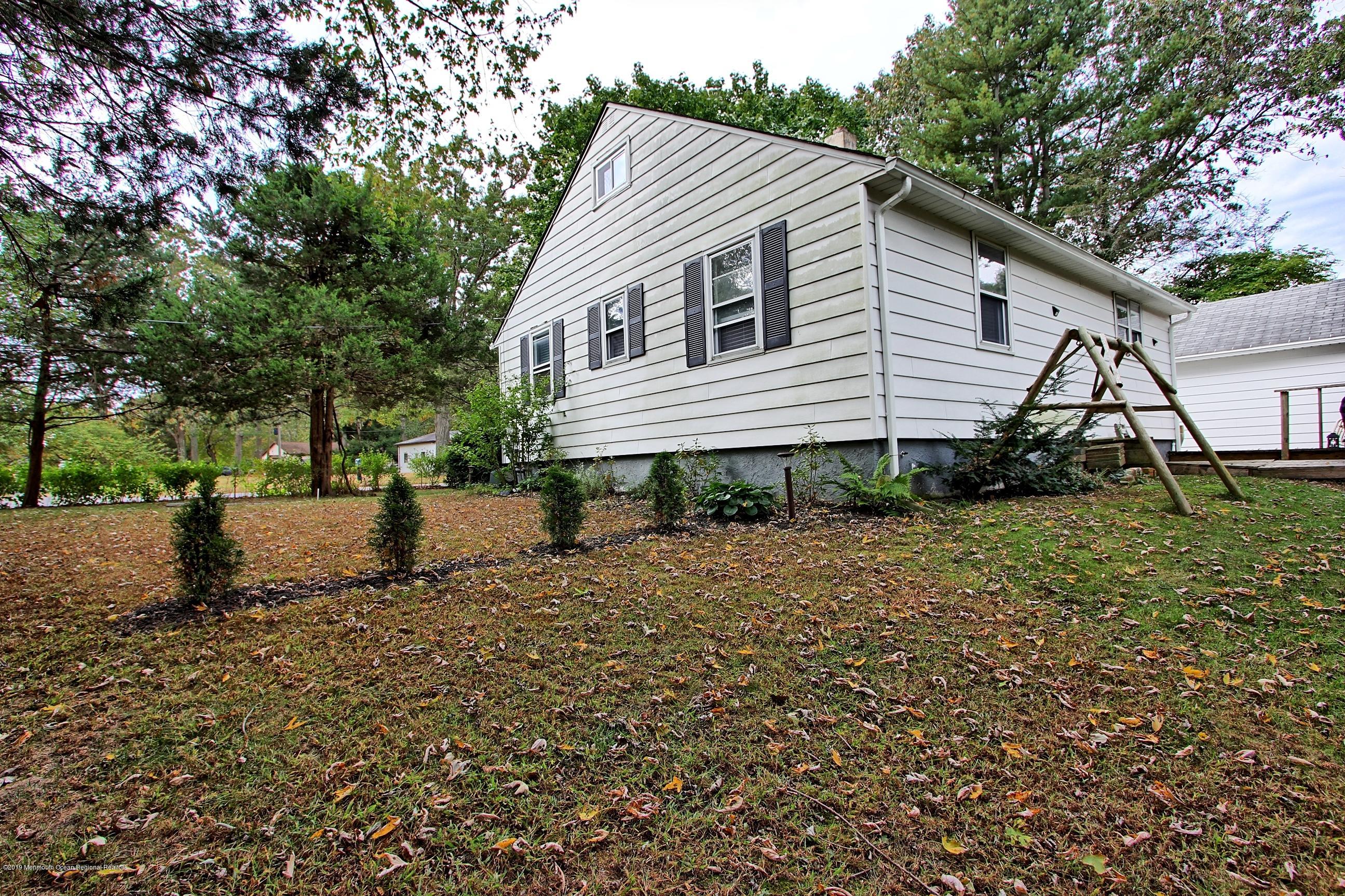 500 Hyson Road Jackson, NJ 08527 - Photo 26 of 30 a view of a house with a yard