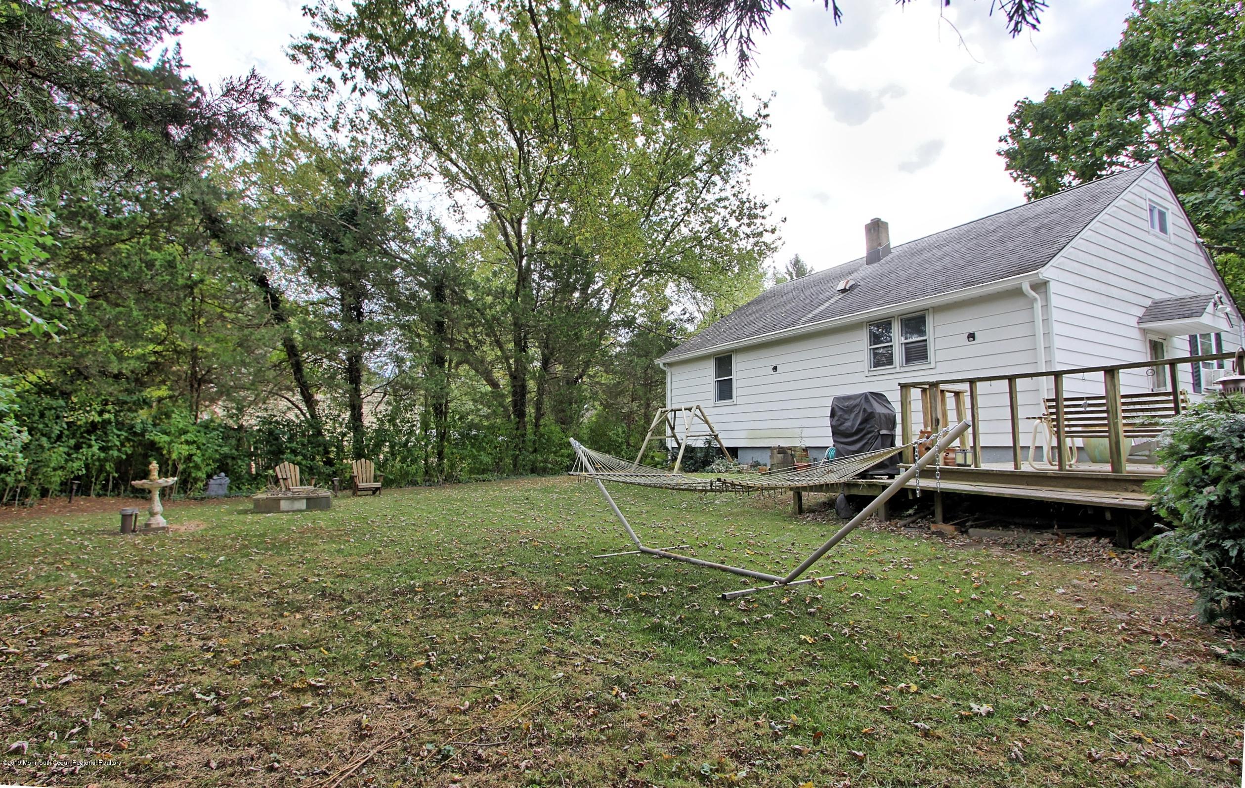 500 Hyson Road Jackson, NJ 08527 - Photo 28 of 30 a view of a house with backyard and trees