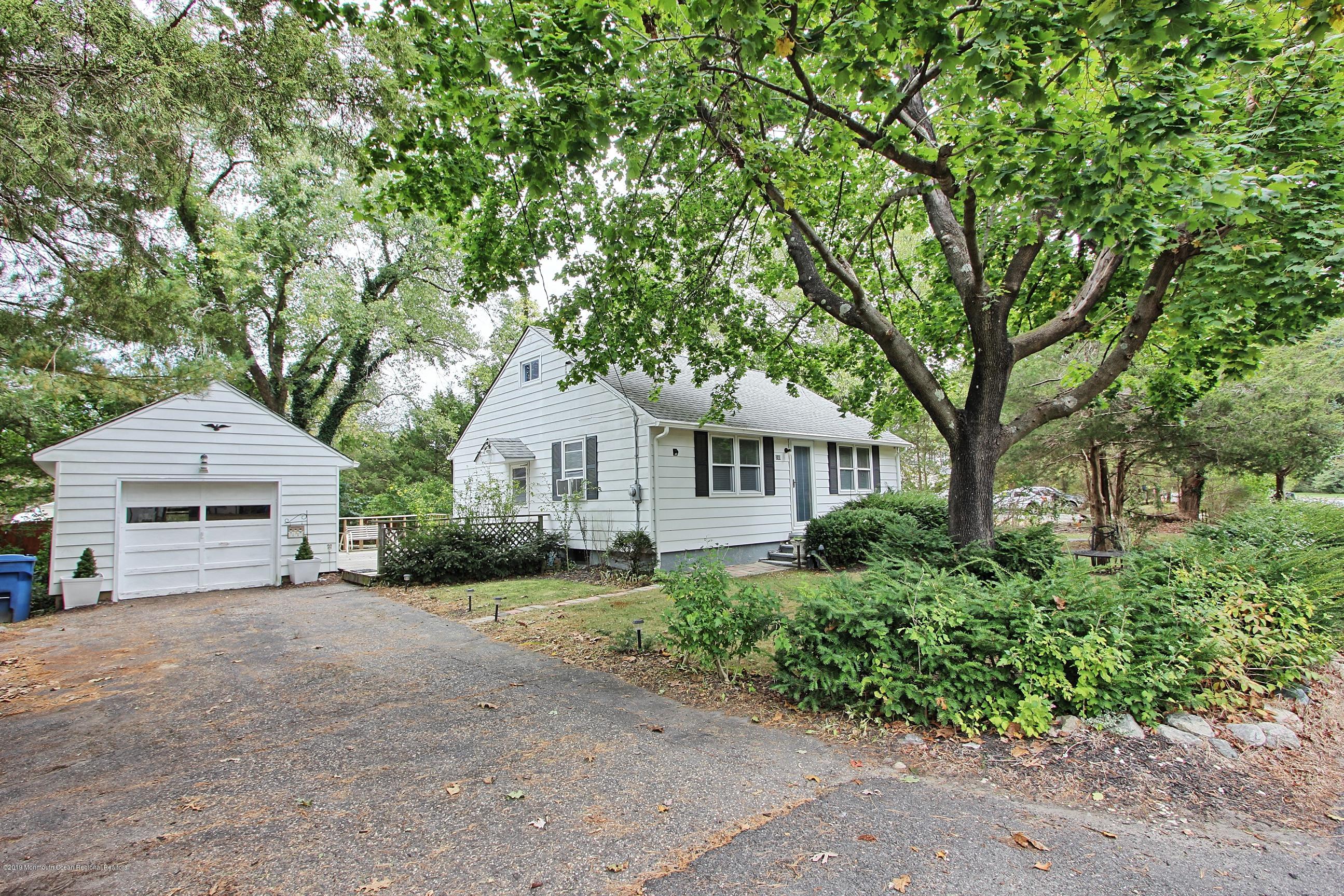 500 Hyson Road Jackson, NJ 08527 - Photo 29 of 30 a front view of a house with a garden