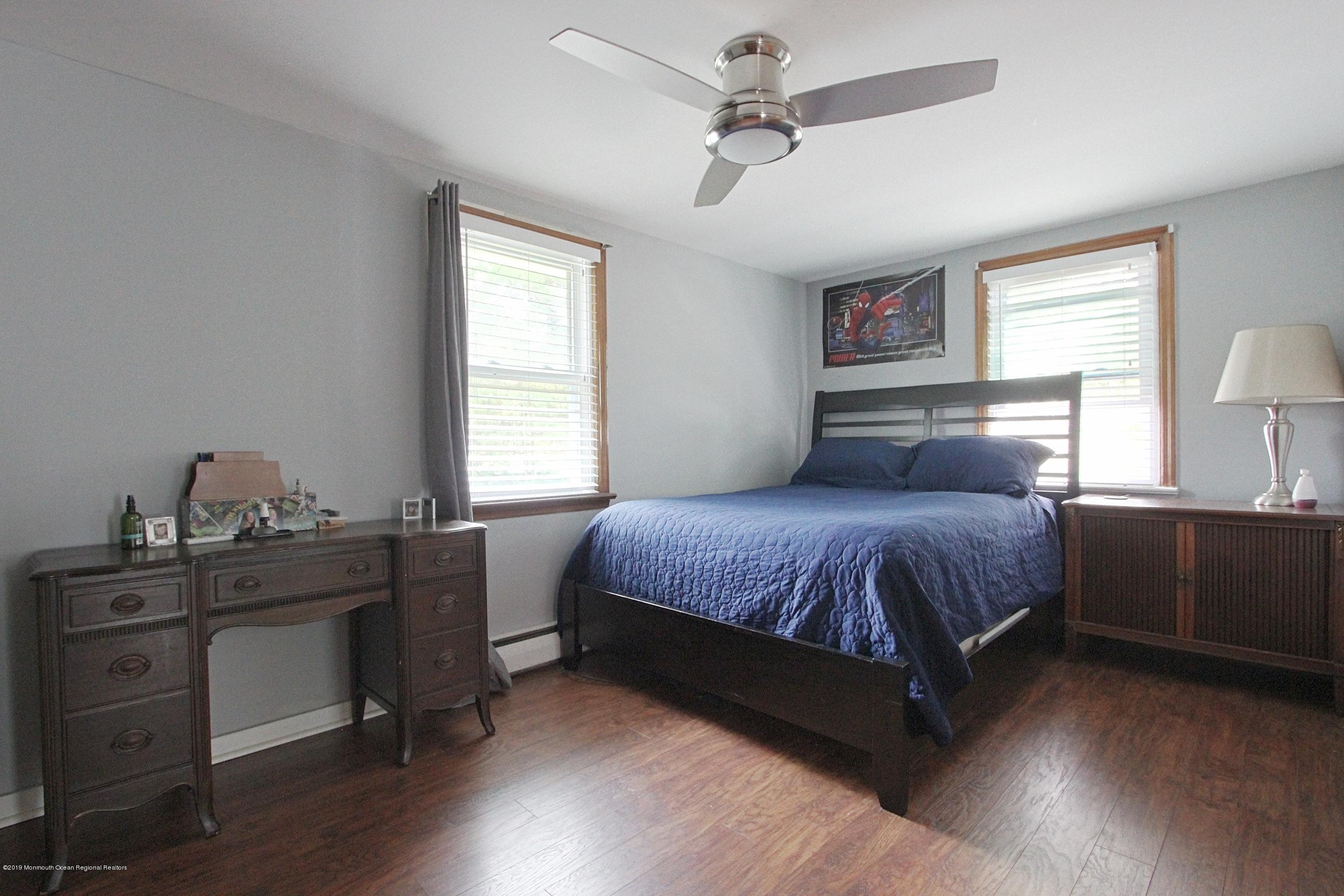 500 Hyson Road Jackson, NJ 08527 - Photo 10 of 30 a bedroom with a bed and a window
