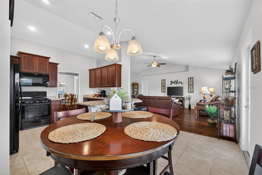2429 Twin Lake View Road Winter Haven, FL 33881 - Photo 21 of 37 a view of a dining room with furniture