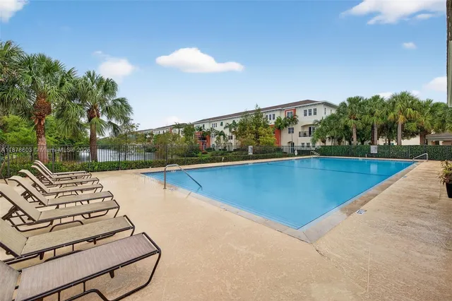 a view of a city with lots of trees