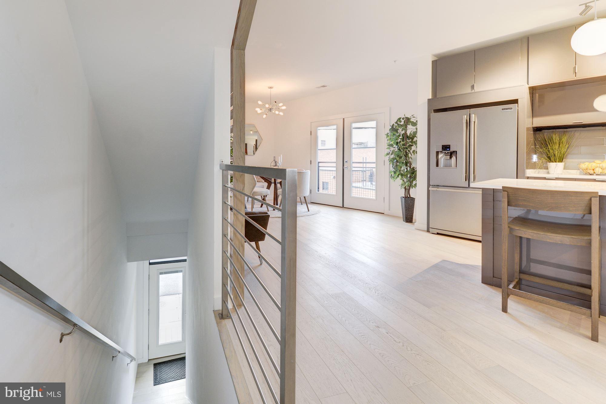 1869 Corcoran Street Northeast, Unit B Washington, DC 20002 - Photo 6 of 30 a view of kitchen with furniture and refrigerator
