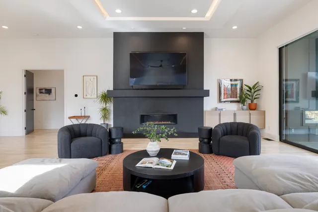 a bathroom with a sink a mirror and shower