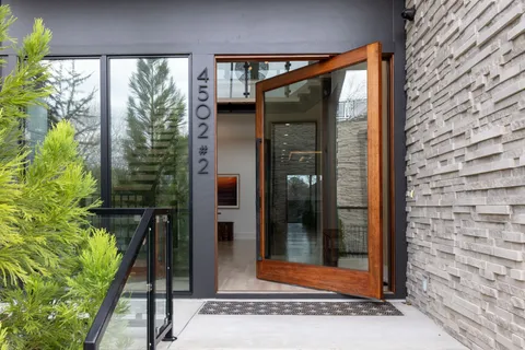 a kitchen with a table and chairs in it