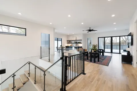 a view of living room with furniture and a flat screen tv