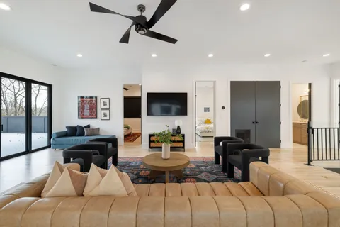 a view of a dining table and chairs in the patio