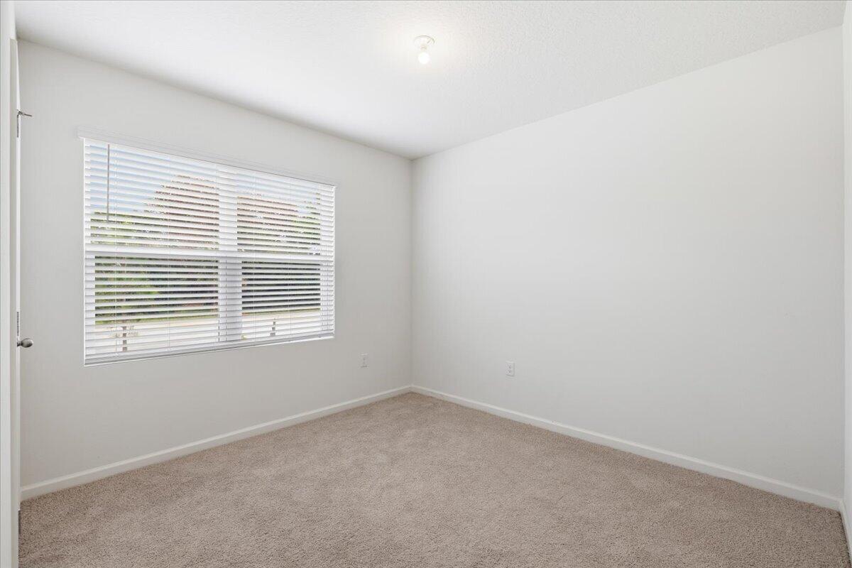 1072 Roseland Road Sebastian, FL 32958 - Photo 20 of 47 an empty room with a window