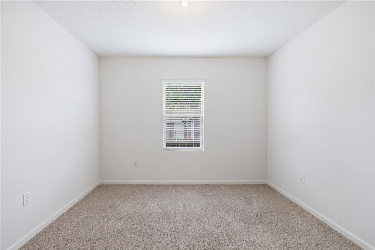 1072 Roseland Road Sebastian, FL 32958 - Photo 24 of 47 an empty room with a window