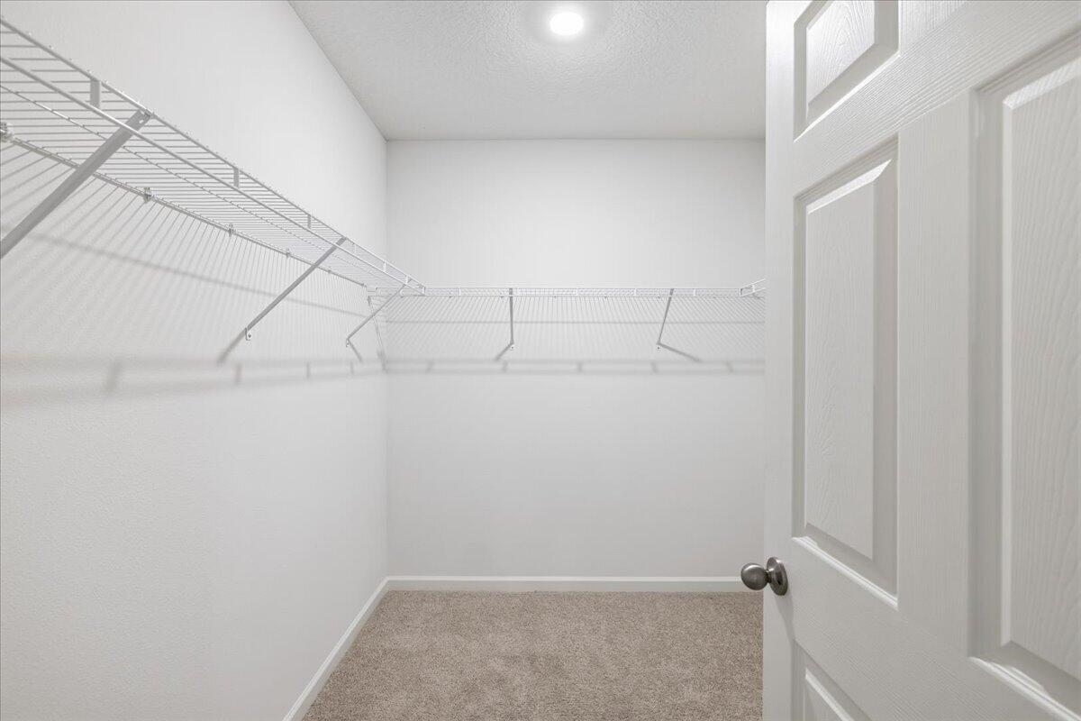 1072 Roseland Road Sebastian, FL 32958 - Photo 36 of 47 a view of a room with racks on the wall